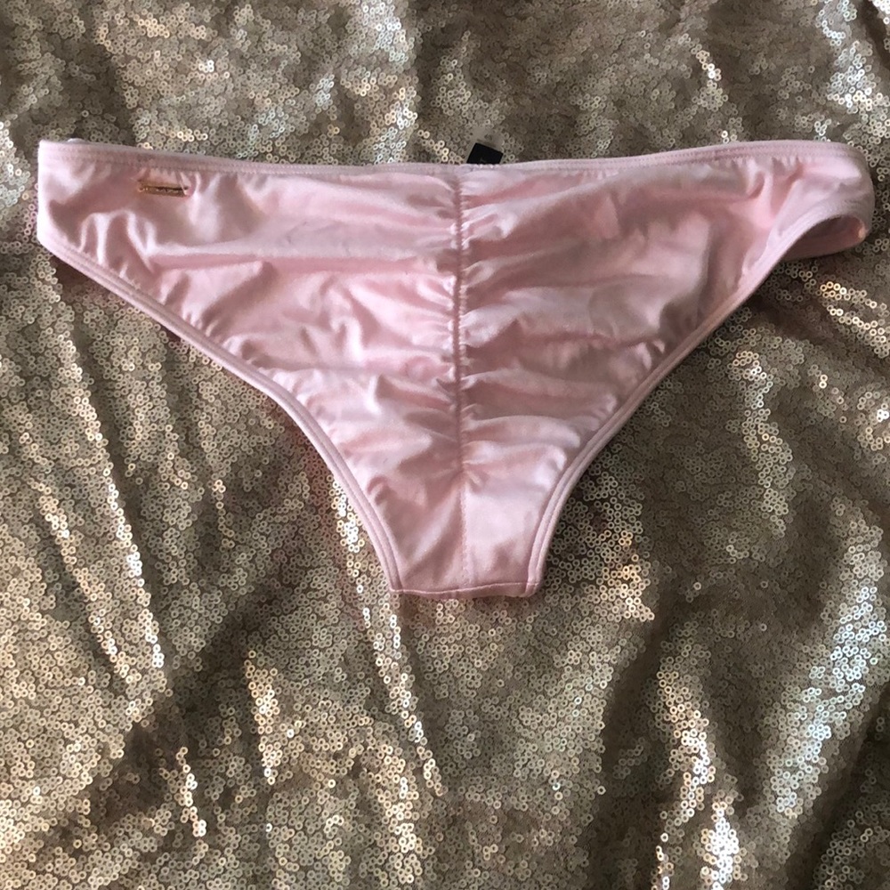 Pink cheeky bikini bottoms